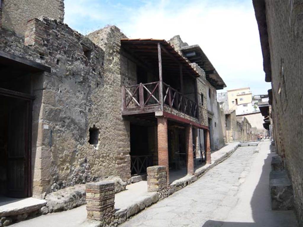 Ins. III 16, on left, Herculaneum May 2009. Looking north from entrance doorway along Cardo IV Inferiore. Photo courtesy of Buzz Ferebee.